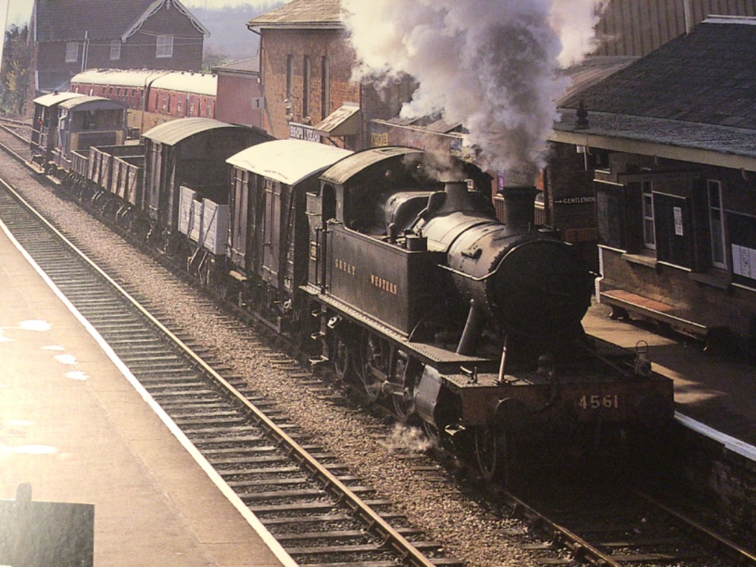 Alex Coomber on Train Siding: A freight operated for the benefit of photographers passes through Bishops Lydeard Station behind a GWR small wheeled prairie No.
4561.