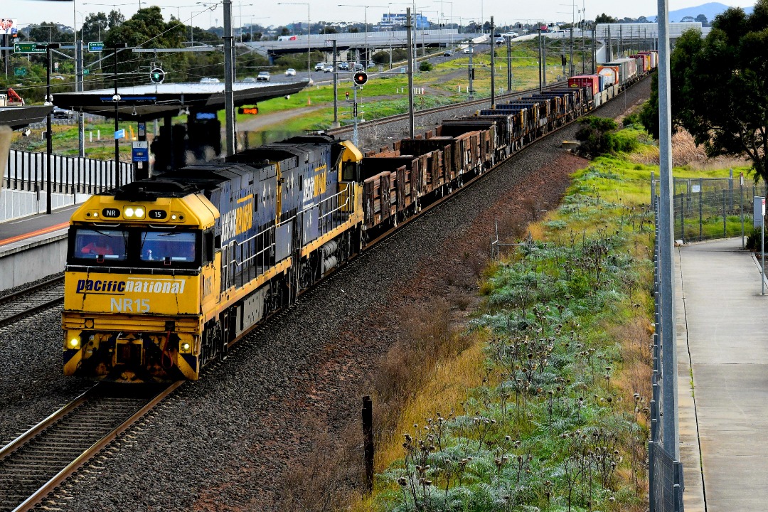 Shawn Stutsel on Train Siding: Pacific National's NR15 and NR65, thunders through Williams Landing, Melbourne with 3XM4, Steel/Intermodal Service ex South
Australia...