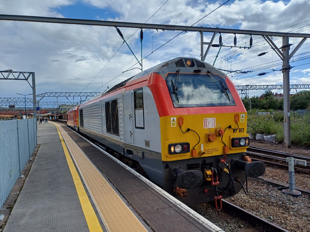 James Taylor on Train Siding: 2 class 67 at crewe Station 67010 and 67017 one in DB red and one in grey and red in transport for Wales livery