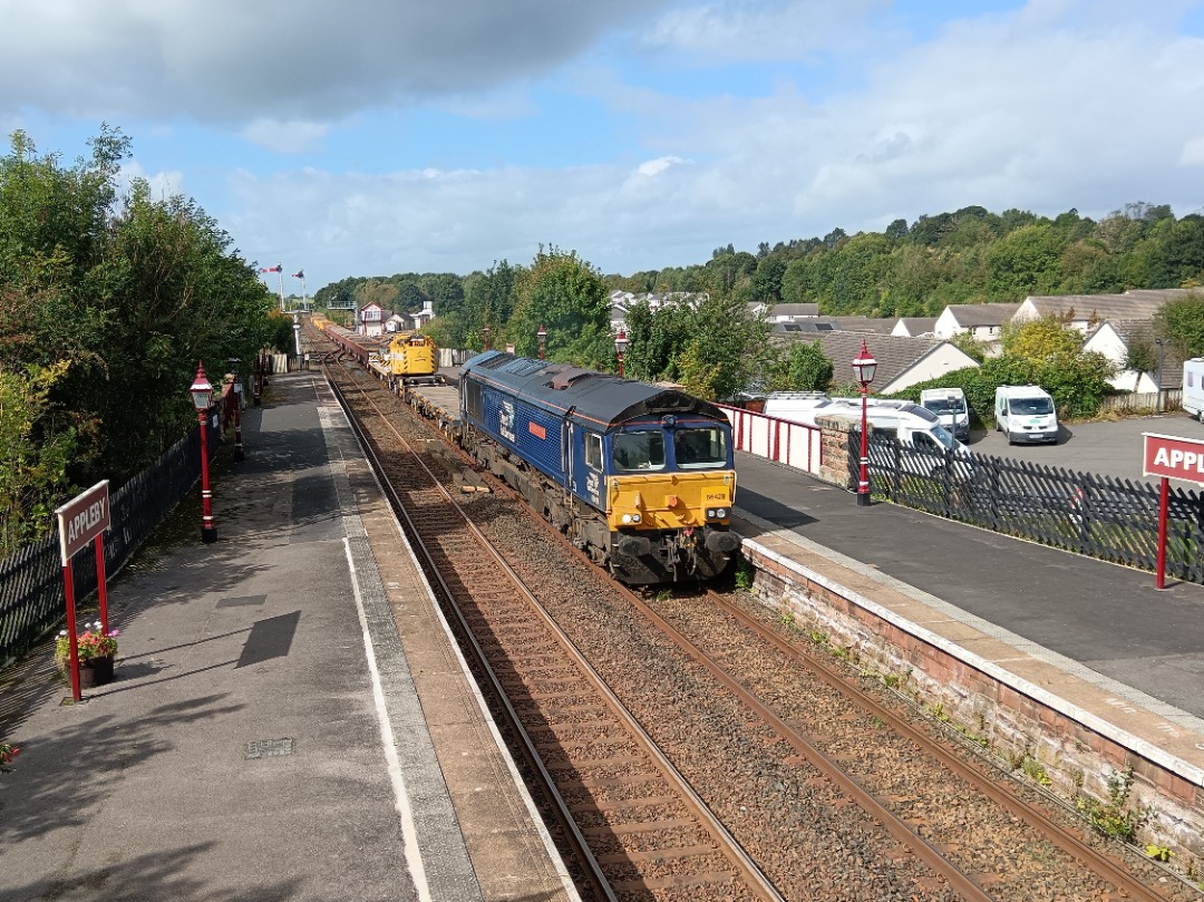 Whistlestopper on Train Siding: DRS class 66/4 No. #66428 "Carlisle Eden Mind" passing Appleby this afternoon working 6K05 1231 Carlisle New Yard to
Crewe Basford Hall...