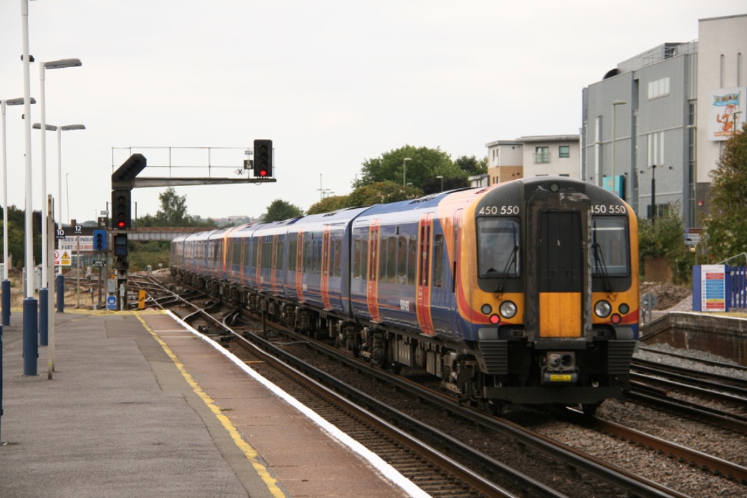 Martin Coles on Train Siding: 10 years ago today, 15th August 2014 at Eastleigh 60091 with mixed wagons, 66517 heading north from Southampton, 450550 powering
through...