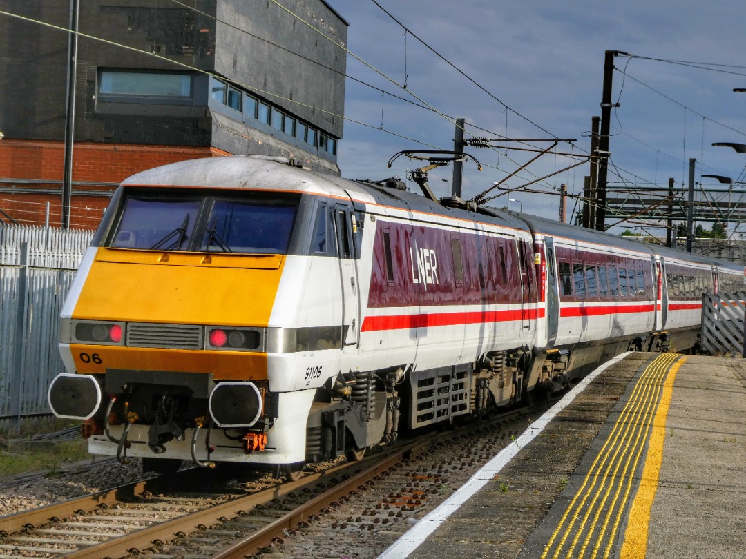 The Jamster on Train Siding: LNER 91106 pushes its train south out of Doncaster while working 1A46 1815 Leeds to London Kings Cross. 21/07/24