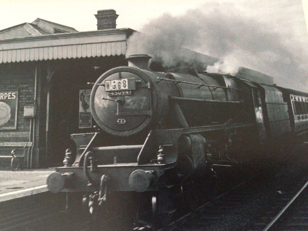 Alex Coomber on Train Siding: A Stanier Black 5 4-6-0 No. 45094 hurries through Holywell Junction Station on the fast line with the North Wales Coast Express
on...