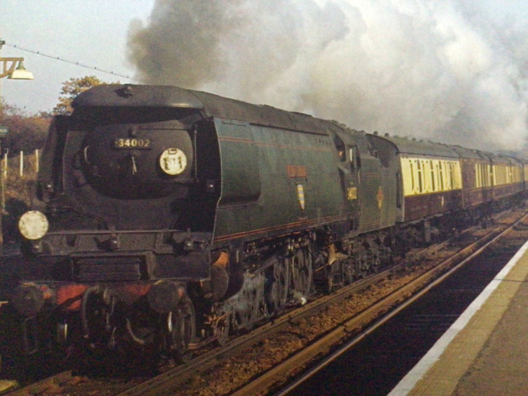 Alex Coomber on Train Siding: An unrebuilt West Country Class 4-6-2 No. 34002 Salisbury makes a fine sight as it streaks through New Malden Station with the
down...