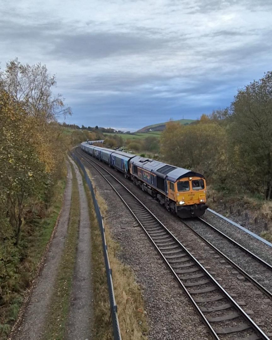 Mark Ogden on Train Siding: 66773 working hard through Diggle as it works 6E10 Liverpool-Drax biomass this afternoon (27/10/24)