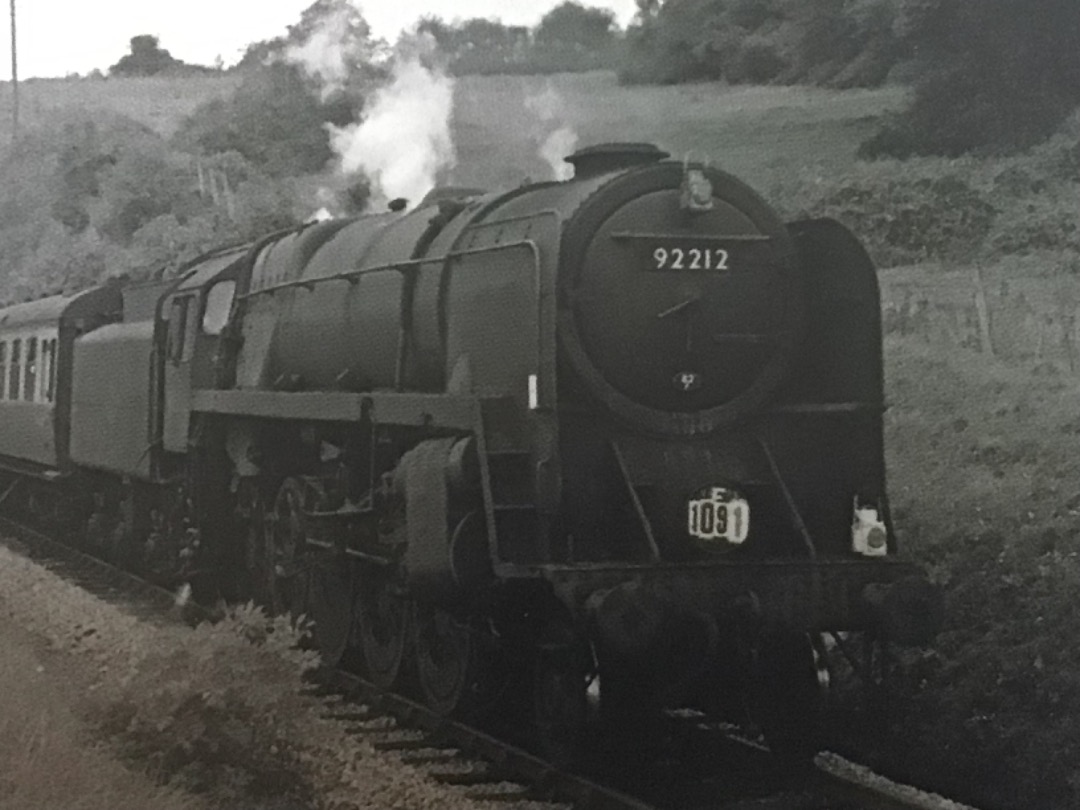 Alex Coomber on Train Siding: Allocated to Bath Green Park Shed. A Standard Class 9F 2-10-0 No. 92212 emerges from the single bore Winsor Hill Tunnel at the
head of a...