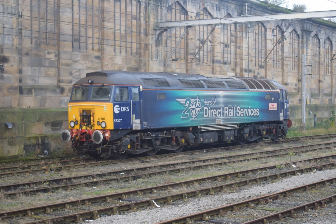 Hardley Distant on Train Siding: CURRENT: Appropriately named WCML Thunderbord Loco 57307 'Lady Penelope' is seen stabled in the sidings to the West
side of Carlisle...