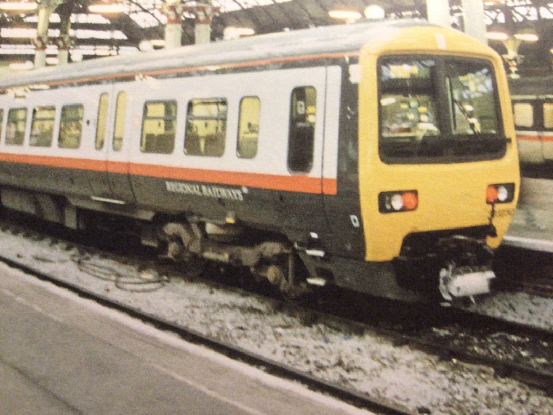 Alex Coomber on Train Siding: A Class 323. No. 323230. No. 323230 waits to leave Manchester Piccadilly for the airport in November 1994.