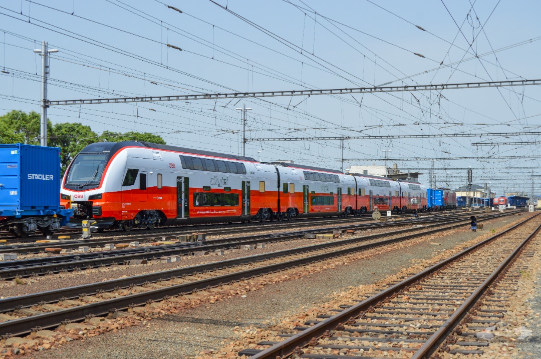 Adam L. on Train Siding: One of the newest and first ever built double-decker Stadler "Kiss" EMU set for the Austrian Railways ÖBB is seen
entering the Břeclav...