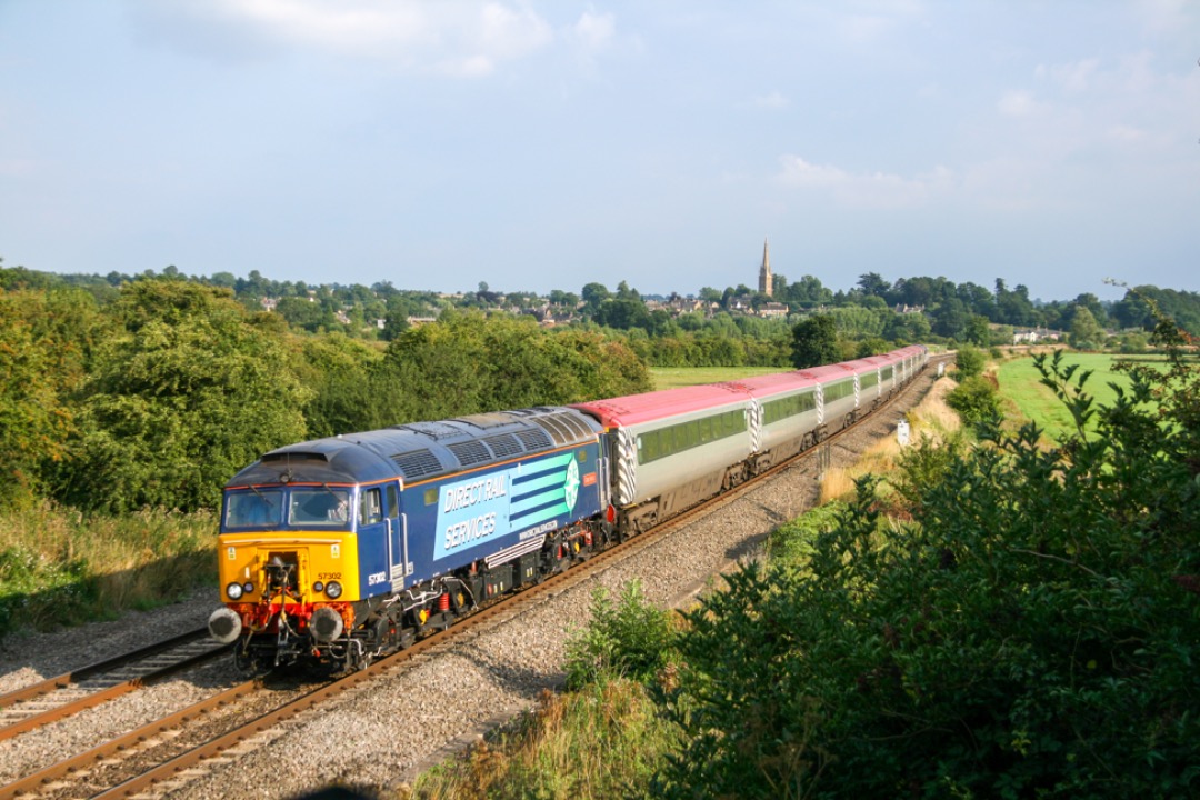 Martin Coles on Train Siding: On this day, 25th August 2013. Direct Rail Services Class 57 57302, passes Kings Sutton with the Virgin Trains
"Prentendalino" Mk 3 set,...