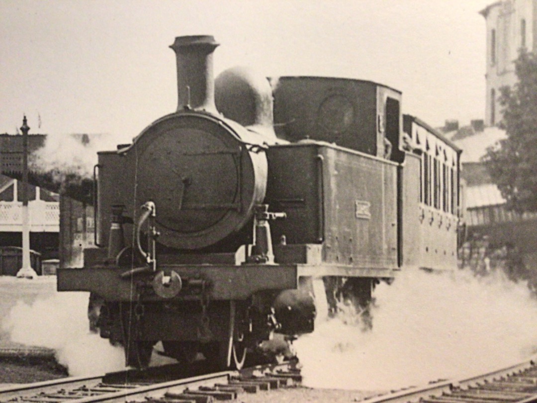 Alex Coomber on Train Siding: A County Donegal Railway Joint Committee 2-6-4 tank No. 2 Blanche leaves Londonderry Northern Counties Committee Station at
Victoria Road.