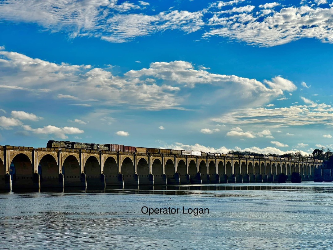 Logan Tracy on Train Siding: Northfolk Southern train waiting for the green light over the Susquehanna in Harrisburg, PA