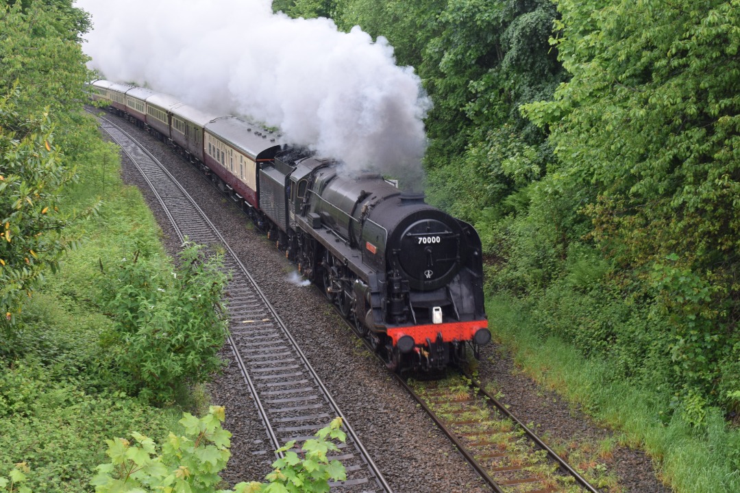 Hardley Distant on Train Siding: CURRENT: 70000 'Britannia' (Front - 1st Photo) and Scotrail liveried 37409 'Loch Awe' (Rear - 2nd Photo)
power through a miserably wet...