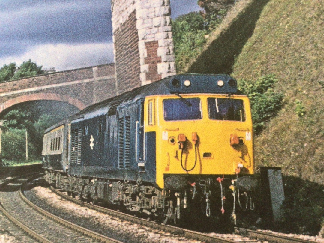 Alex Coomber on Train Siding: A Class 50. 50003 leaves Teignmouth with the unidentified express to London Paddington on 20th July 1976.