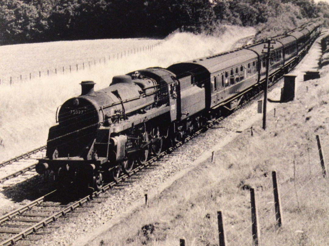 Alex Coomber on Train Siding: Nearing the end of the line. A BR Standard Class 4MT 4-6-0 No. 75027 approaches Corfe Mullen with an up express in the Summer of
1960....