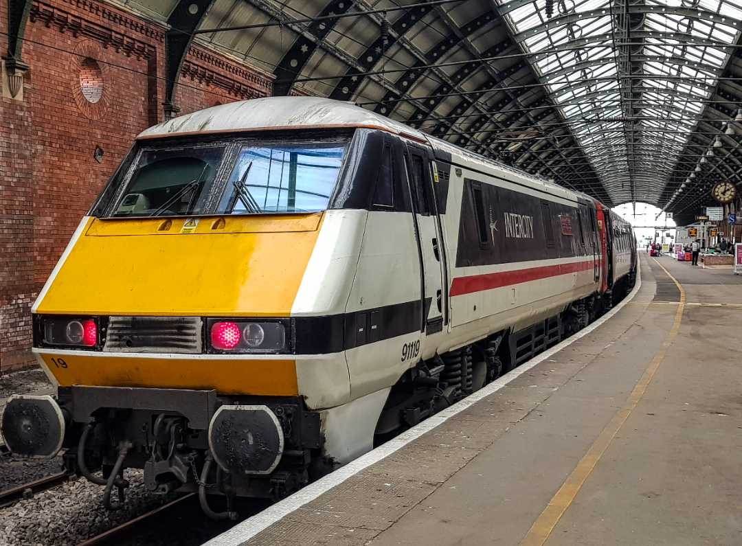 Josh Armstrong on Train Siding: Here is my first post! 91119 pushing her rake of MK4 coaches away from Darlington in February.