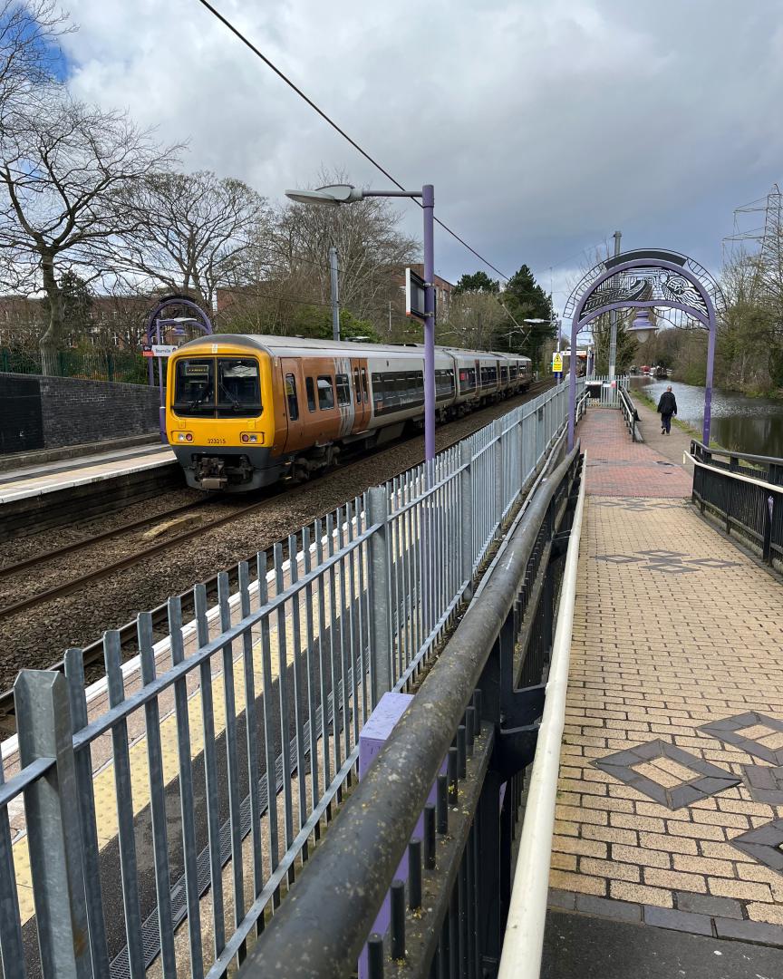RodRail on Train Siding: #WMR class #323 #CrossCity Line at #Bournville, direction Birrmingham and Four Oaks. Besides the Worcester-Birmingham canal. The
building in...