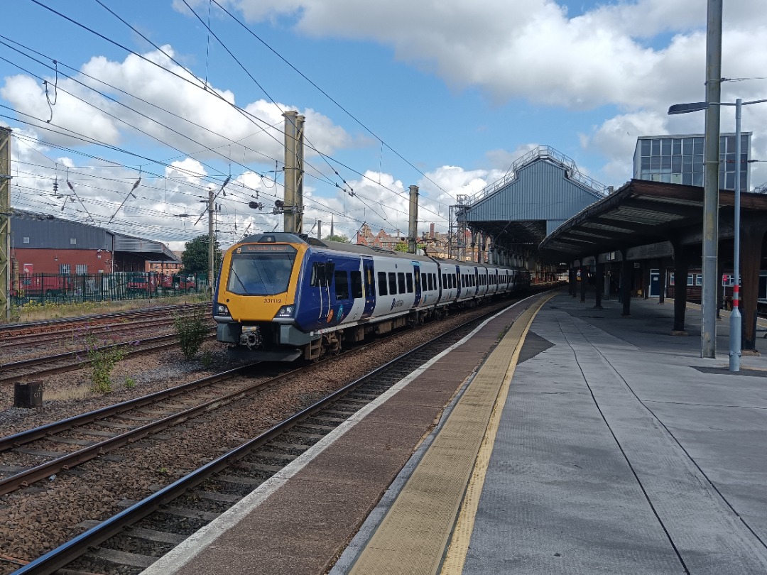 Whistlestopper on Train Siding: Northern class 331/1 No. #331112 departing Preston working 1Y59 0926 Blackpool North to Manchester Airport.