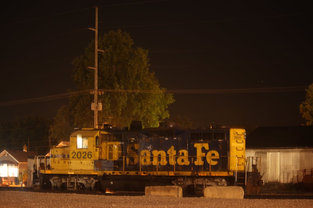 Mason Halsey on Train Siding: Napolean Defiance and Wetsern Locomotives sit quietly in Defiance, Ohio on a warm July, 2024 Night.