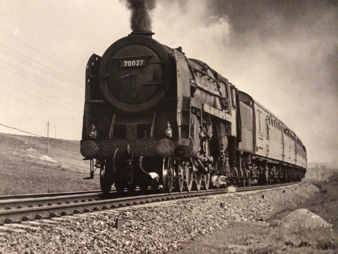 Alex Coomber on Train Siding: A BR Standard Class 7MT Britannia 4-6-2 No. 70027 once named Rising Star. But now devoid of nameplates attacks Shap Bank near
Scout Green...