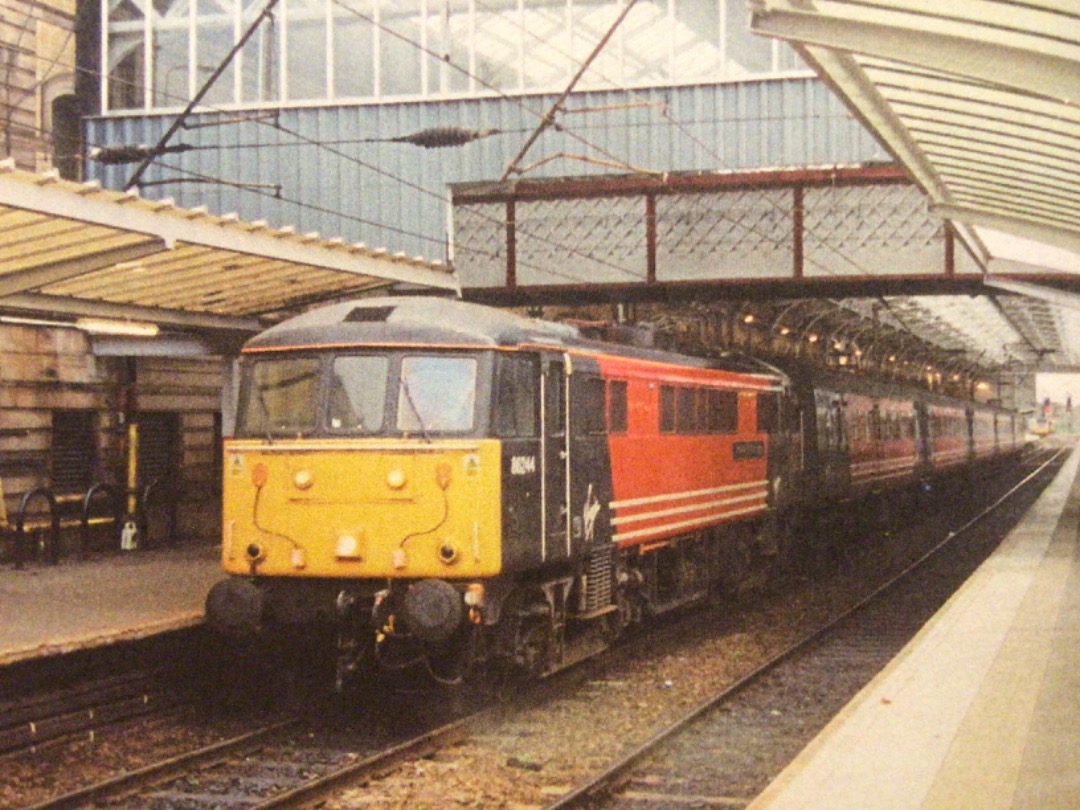 Alex Coomber on Train Siding: A Class 43 HST. No. 43083 and a Class 86. No. 86244 Royal British Legion. No. 43083 sports the striking Virgin Cross Country
Livery as it...