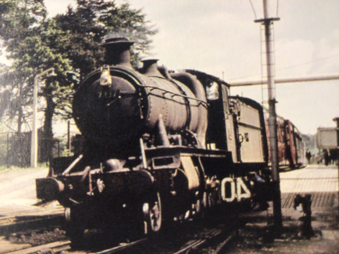 Alex Coomber on Train Siding: A regular performer on the Taunton to Barnstaple Line. No. 7337 is seen here taking on water at South Molton at the head of a
Barnstaple...