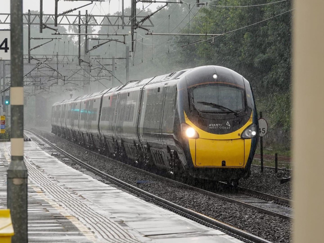 Inter City Railway Society on Train Siding: Class 390135 is seen passing Bushey working 1H35 London Euston to Manchester Piccadilly.