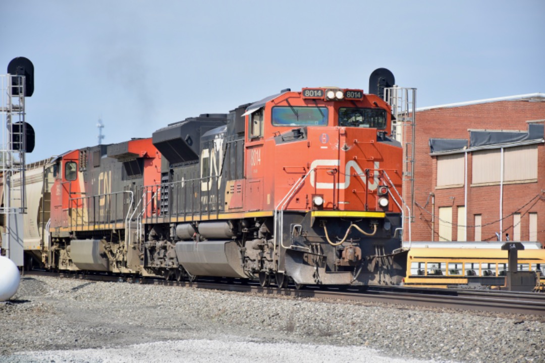 Railfan Ashton Productions on Train Siding: CN SD70M-2 with a high headlight leads Norfolk Southern 62U EB in Butler Indiana