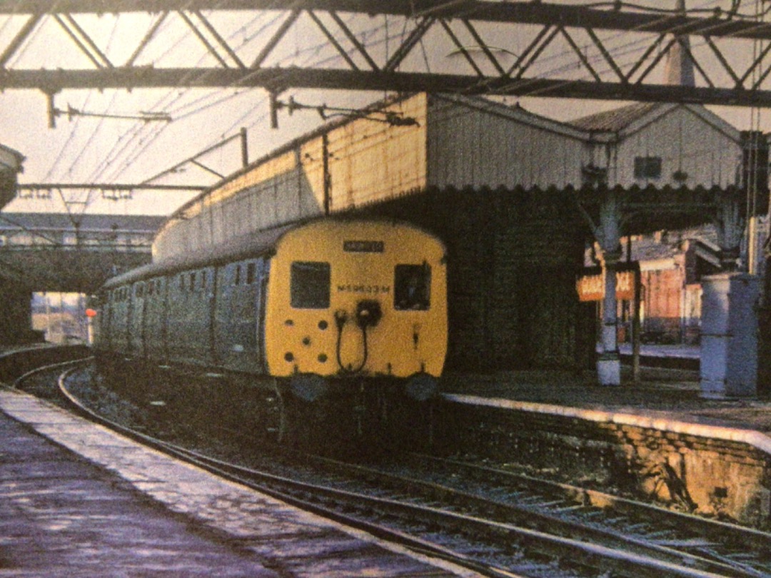 Alex Coomber on Train Siding: A Class 506 EMU leaves Guide Bridge with a service to Glossop and Hadfield on 17th November 1973.