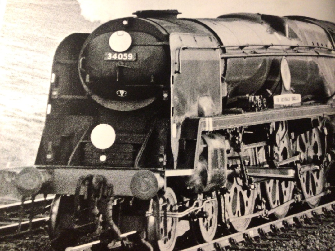 Alex Coomber on Train Siding: Looking in tip top ex works condition. An unrebuilt Battle of Britain Class 4-6-2 No. 34059 Sir Archibald Sinclair heads an up
milk train...