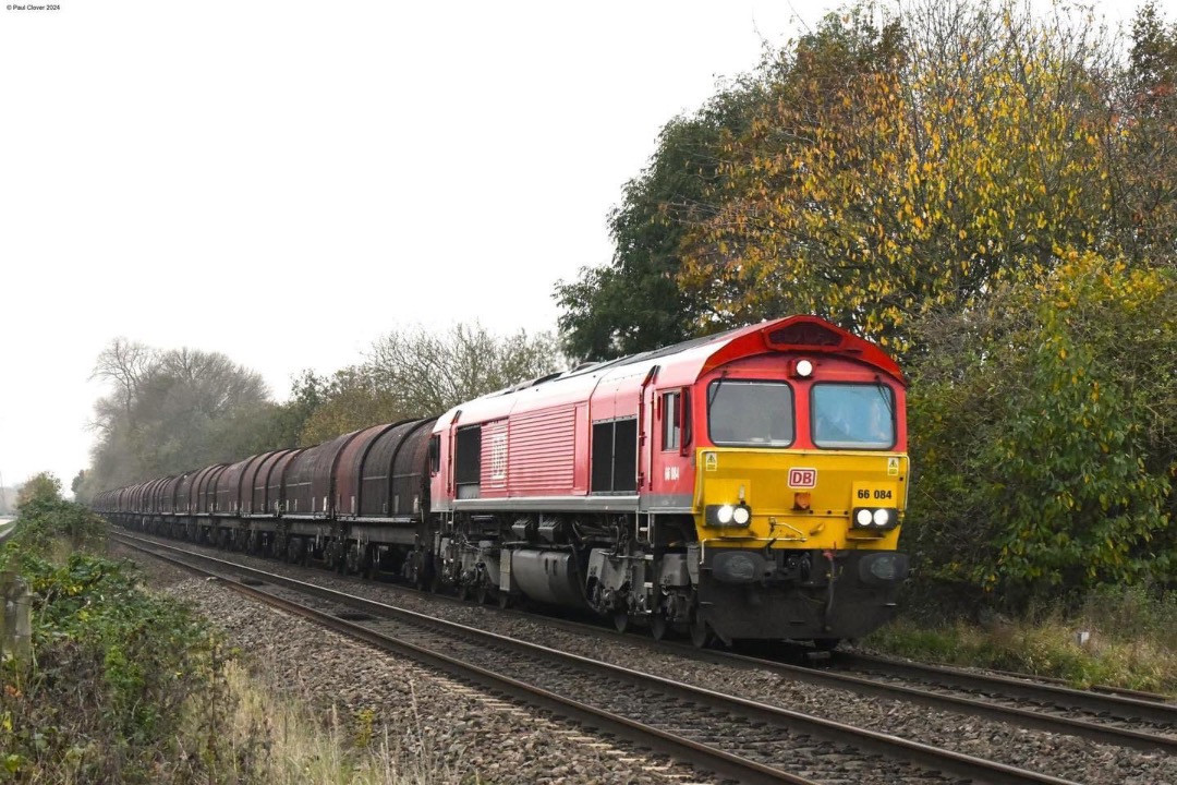 Inter City Railway Society on Train Siding: 66084 working the 6E01 1005 Wolverhampton Walsall Street Steel Terminal to Boston Sleaford Sidings.