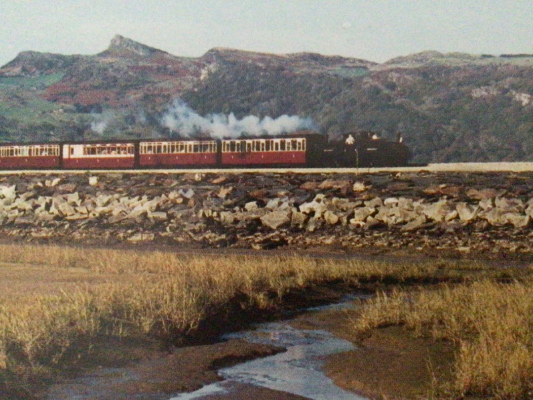 Alex Coomber on Train Siding: One of the Ffestiniog Railways Double Fairlie 0-4-0+040 locomotives heads an impressive 10 coach train for Blaenau Ffestiniog
across the...