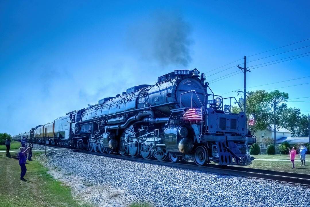 Phil Ostroff on Train Siding: Union Pacific 4014 steams away from Marlin, Texas towards Fort Worth on its "Heartland of America" tour on October 9th,
2024. Large...