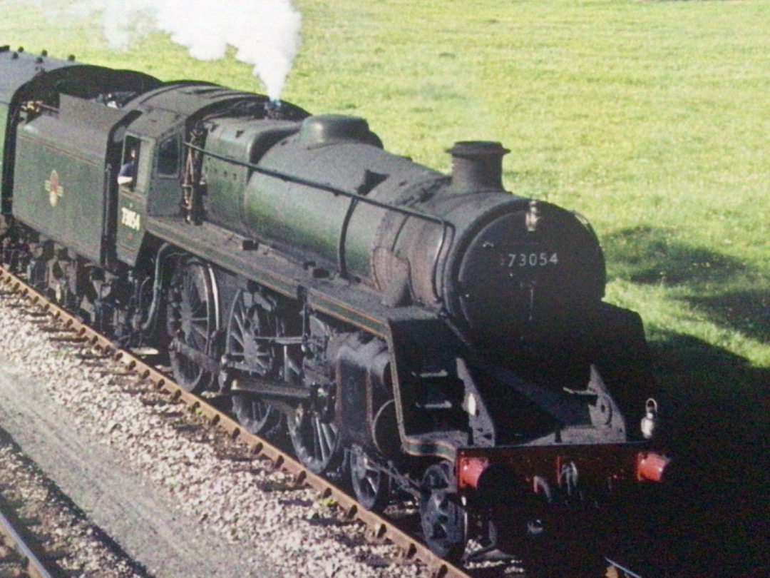 Alex Coomber on Train Siding: A Green Liveried BR Standard Class 5MT 4-6-0 No. 73054 heads the 15:35PM train from Bristol Temple Meads to Bournemouth West a
mile north...