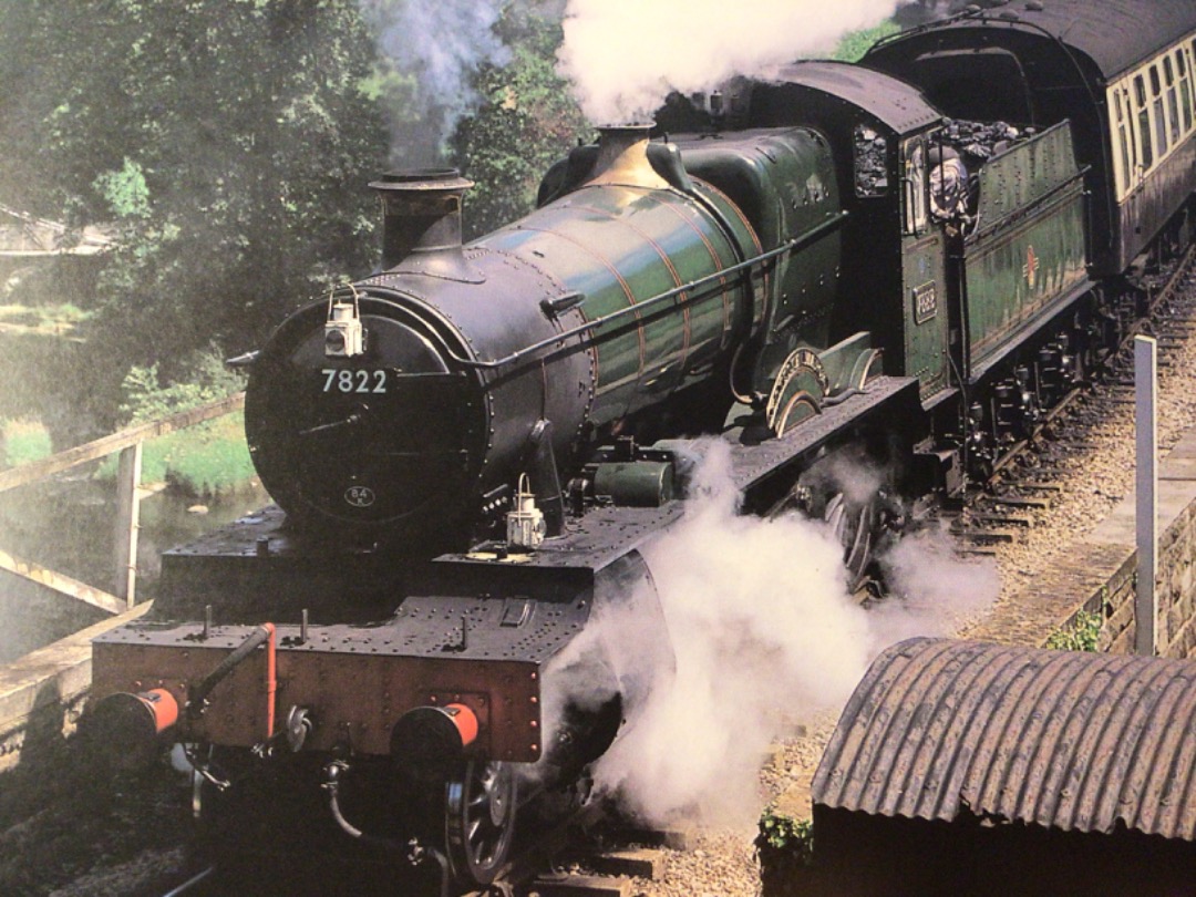 Alex Coomber on Train Siding: A BR built 4-6-0 No. 7822 Foxcote Manor leaves Berwyn for Carrog with the suspension bridge on the left. No. 7822 worked over the
line...