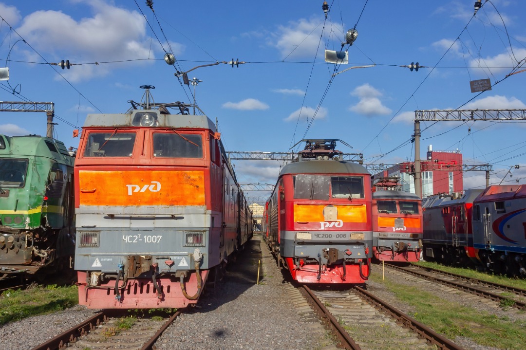 CHS200-011 on Train Siding: Electric locomotive ChS2T-1007 and high-speed electric locomotives ChS200-006 and ChS200-003 at the St. Petersburg
Passazhirsky-Moskovsky...