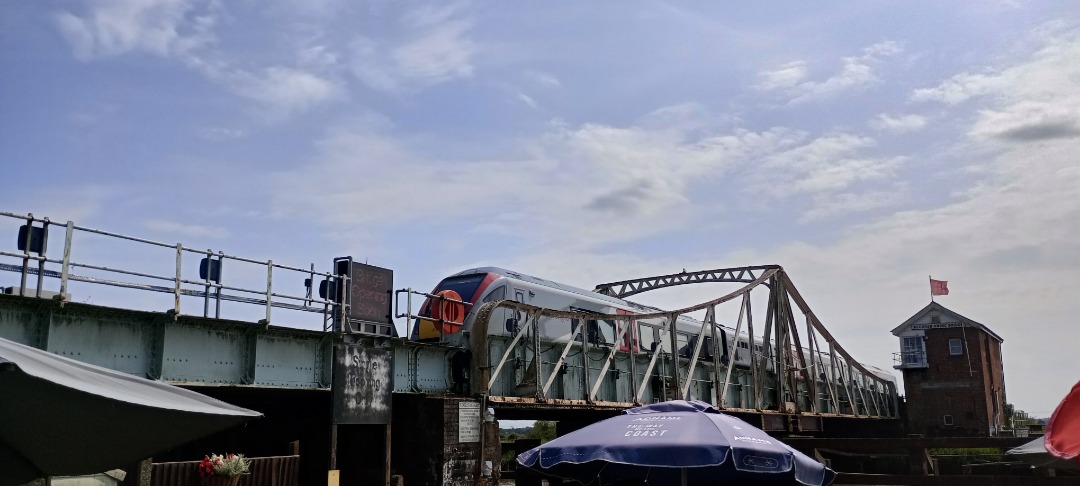 Hardley Distant on Train Siding: CURRENT: 755334 crosses Reedham Swing Bridge on Wednesday 24th July 2024 with the 2J78 14:05 Norwich to Lowestoft (Greater
Anglia)...