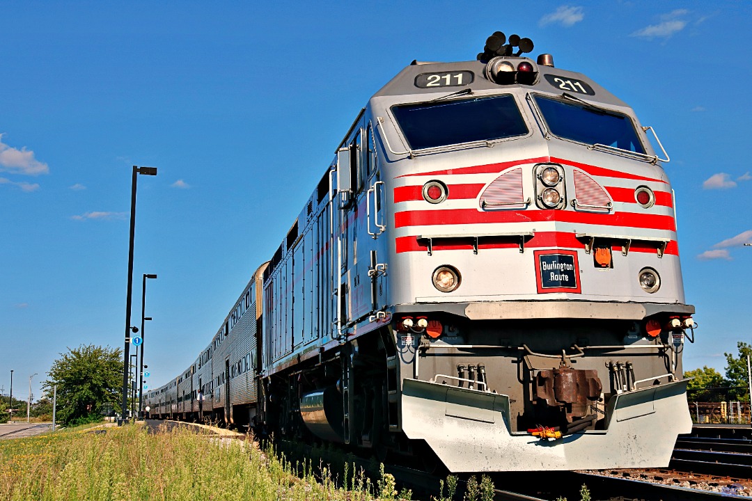 Randall Meadows on Train Siding: METX 211 at Cicero ,IL just after I got off of this train i ran to the head end to try and get pictures of the CB&Q
heritage unit and...