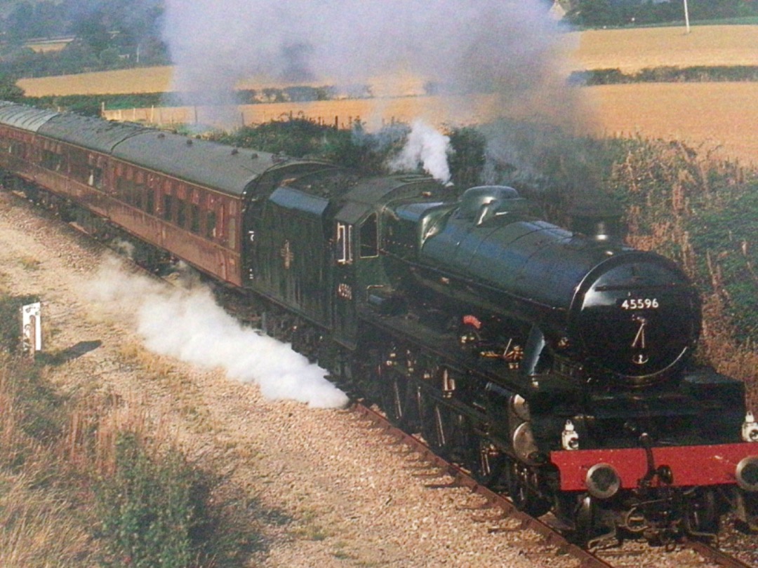 Alex Coomber on Train Siding: On loan Jubilee 3 cylinder 4-6-0 No. 45596 Bahamas nears Hailes Abbey with a rake of maroon British Railways Mark 1 coaches
recalling the...