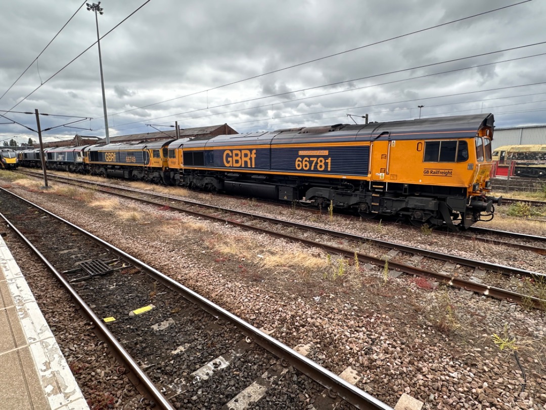 Michael Gates on Train Siding: Five class 66's in the form of 66716 + 66747 + 66749 + 66781 + 66303 await departure from Doncaster to Tyne Yard on 13th
July 2024.