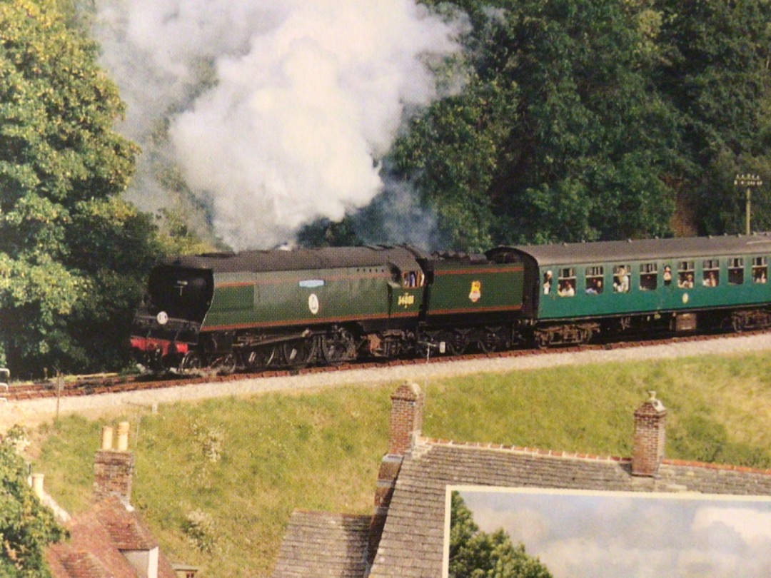 Alex Coomber on Train Siding: A preserved unrebuilt Battle of Britain Class 4-6-2 No. 34081 92 Squadron heads out of Corfe Castle Station on the Swanage Railway
with a...