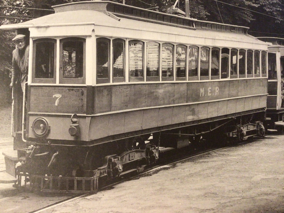 Alex Coomber on Train Siding: Laxey on the Manx Electric Railway in 1955 with vestibuled saloon No. 7 built in 1894 with a body by Mylnes and cross bench open
trailer...