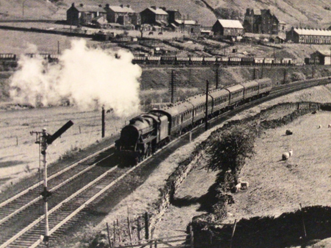 Alex Coomber on Train Siding: A Stanier Black 5 4-6-0 No. 45290 of Newton Heath Shed 26A has a light load to haul up Shap Bank as it starts the climb north of
Tebay...