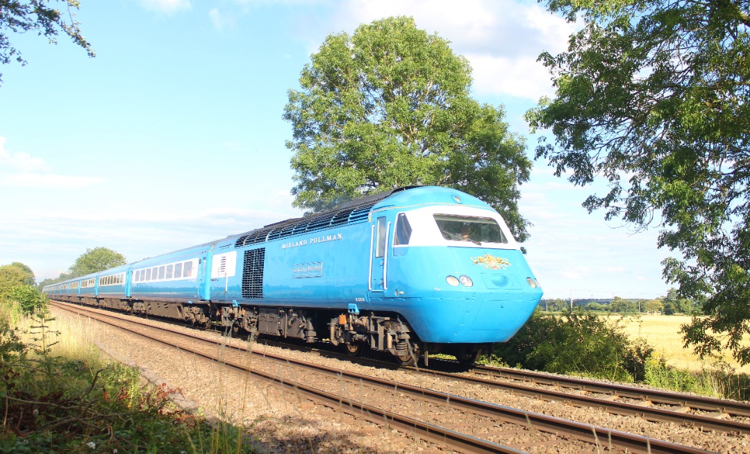 Jamie Armstrong on Train Siding: Midland Pulman 43046 & 43049 5Z61 1437 Colchester Goods Loop to Crewe H.S. Seen passing Swarkestone Lock Foot crossing,
Derby (16/06/24)