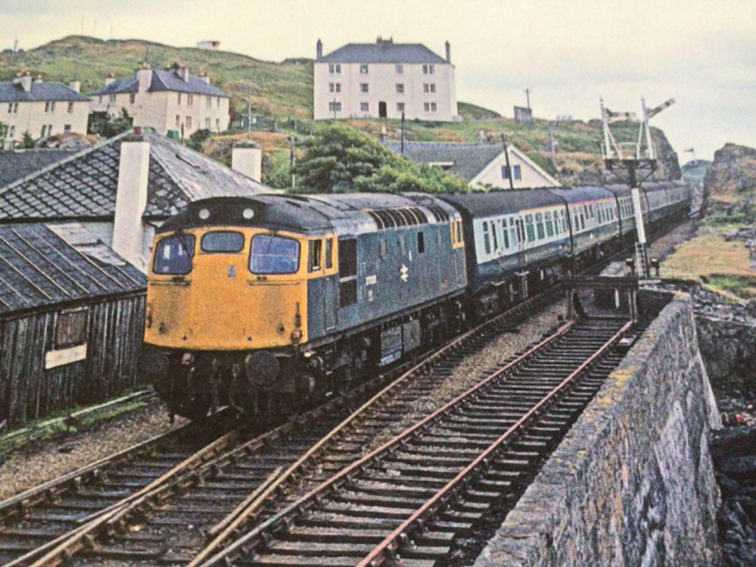 Alex Coomber on Train Siding: A Class 27. 27033 arrives at Mallaig with the 08:36 AM from Glasgow Queen Street on 20th July 1977.