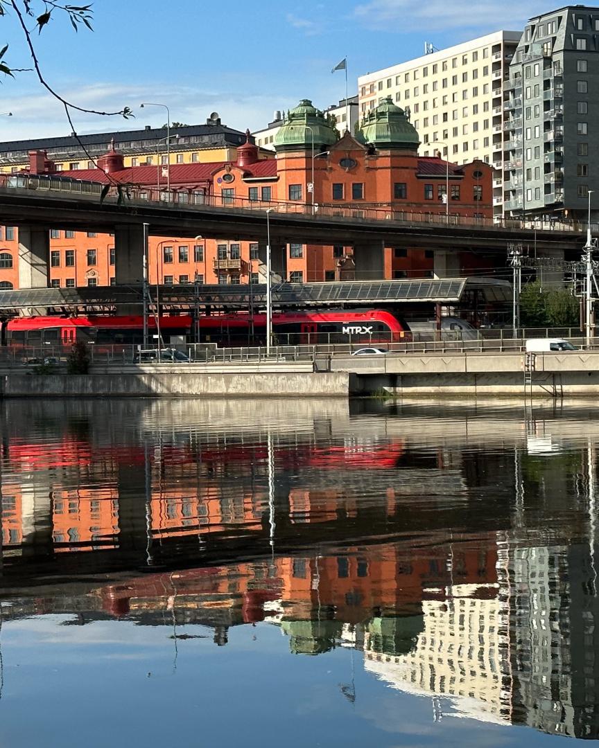 Pella on Train Siding: An MTRX train (Stadler Flirt Nordic, Swedish class: X74) waiting at the service station just north of Stockholm central station.