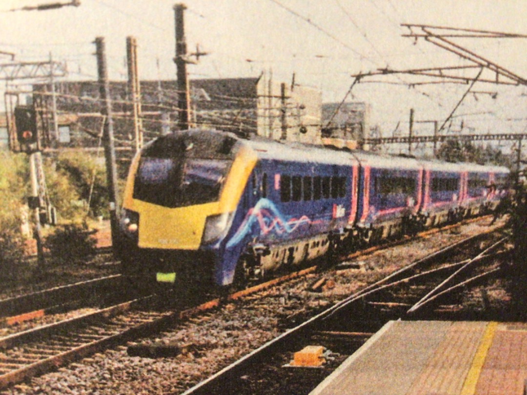 Alex Coomber on Train Siding: A Class 180 is travelling too fast to catch the number. A Class 180 speeds past Alexandra Palace with the 16:03 PM from London
Kings...