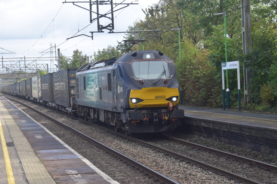 Hardley Distant on Train Siding: CURRENT: 88002 'Prometheus' passes through Acton Bridge Station today with the 4S44 12:05 Daventry International
Railfreight Reception...