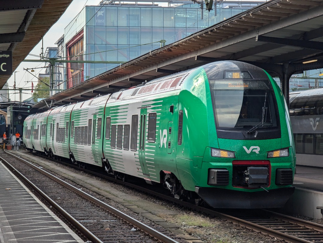 T. Rain on Train Siding: VR X74 001 which is the first and currently only FLIRT Nordic in service bearing new green stickers.