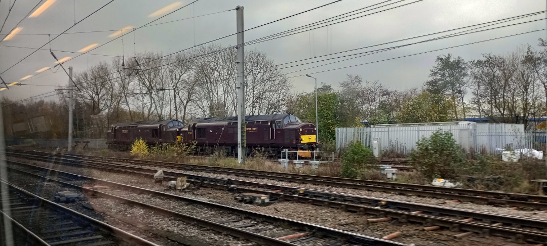 Hardley Distant on Train Siding: CURRENT: West Coast Railways 37685 (Left) and 37668 (Right) are seen stabled in Carlisle High Wapping Sidings today between
duties.